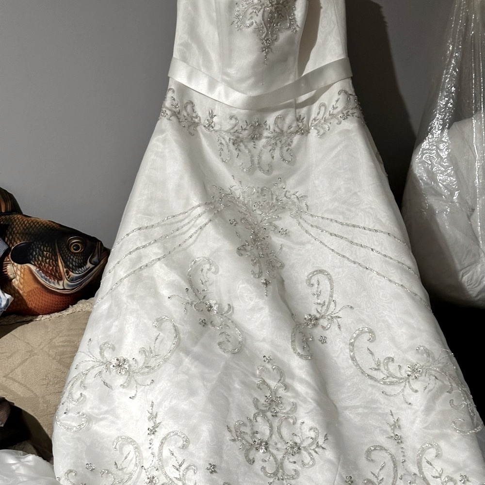 Size 12 strapless wedding dress with long train and silver sequins